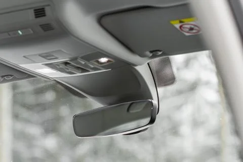 The rear view mirror inside the car. Stock Photos