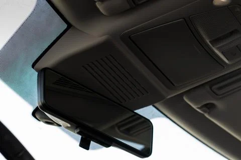 The rear view mirror inside the car. Stock Photos