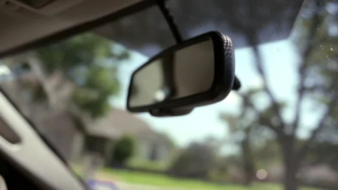 Rear-view mirror inside driving car Stock Footage 191356745