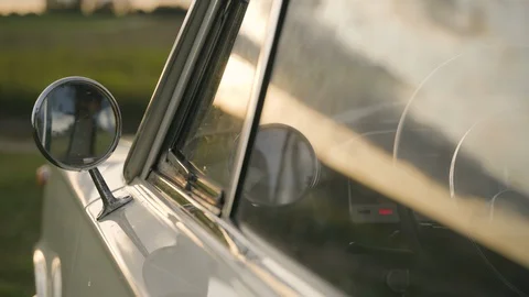 Rear view mirror of old white vintage soviet car Stock Footage 127850341