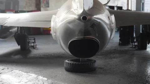 Rear View Of Old Plane In A Hangar Stock Footage 293303064