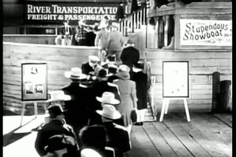 Rear view of passengers boarding showboat Stock Footage