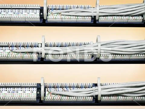 Rear view of a patch panel with wires rear view of a patch panel with ...