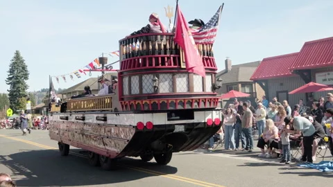 Rear view of the pirate ship parade float moving down the street i sammer egg 35 Video stock 339530230