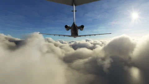 Rear view of a private airplane flying above clouds Stock Footage 246890767