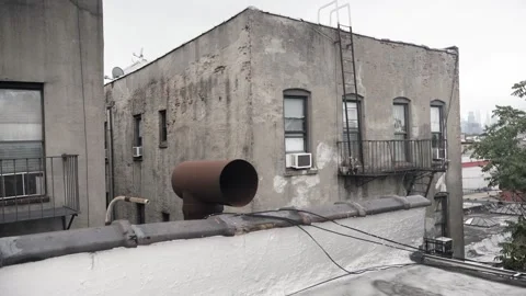Rear View from Rooftop of old apartment buildings Stock Footage 249625280