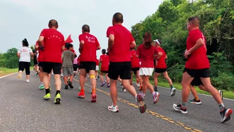 Rear view runners stretching into distance Stock-Footage 341784483