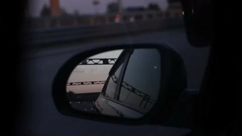 Rear View In The Side Mirror Of The Car In The Evening Stock Footage 163183339
