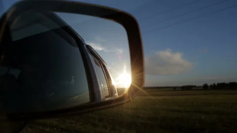 Rear view side mirror in moving car Stock Footage 94106348