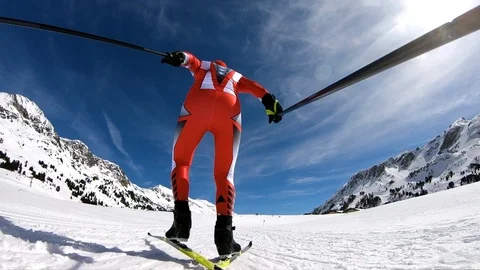 Rear view slow motion cross country skier low perspective Stock Footage 88476862