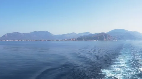 Rear View from a small boat sailing away from ground Stock Footage 80169314
