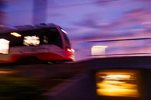 Rear View of a Speeding Train at Twilight Stock Photos