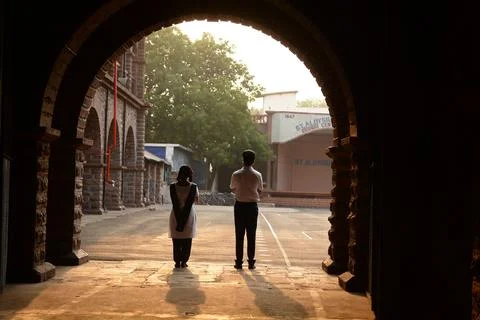 Rear view of Students at Building Arch Fotos Stock