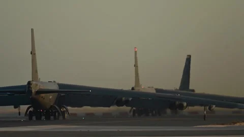 Rear view of three U.S. Air Force B-52H Stratofortress aircraft taxiing Stock Footage 295350281