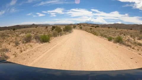 Rear View Time Lapse Drive Along Cathedral Valley Road in Capitol Reef National  Stock Footage 340291612