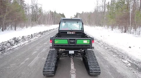 Rear view of tracked snow utility vehicle Stock Footage 60969342