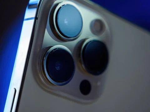 Rear view of triple improved camera array on iPhone 13 Pro at the Apple Store as Stock-Fotos