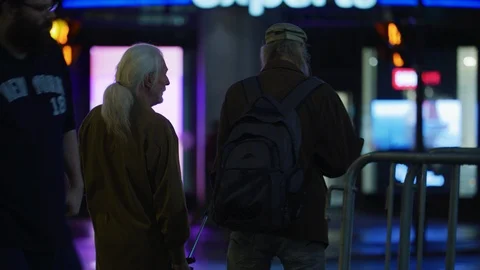 Rear view of two elderly people Stock Footage 99916328
