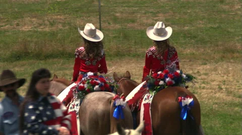 Rear view of two mounted rodeo princesses Stock Footage 59533289