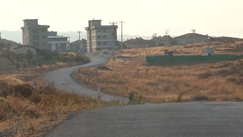 Rear view of two people sitting on a motorbike Stock Footage 166018390