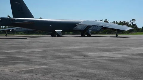 Rear view of U.S. Air Force B-52 Stratofortress aircraft taxiing Stock Footage 272587782