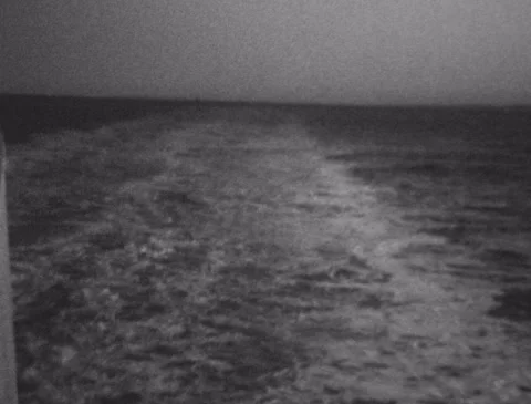 Rear view of wake from ocean ferry, Italy - Vintage / retro Super 8 film footage 動画素材 245826876