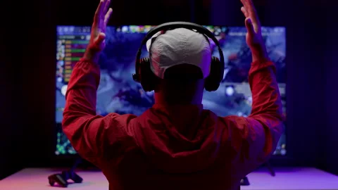 Rear view young Player video computer pc hands on head feeling stressed. Stock Footage 162374746