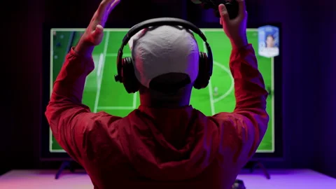 Rear view young Player video computer pc hands on head feeling stressed. Stock Footage 162375598