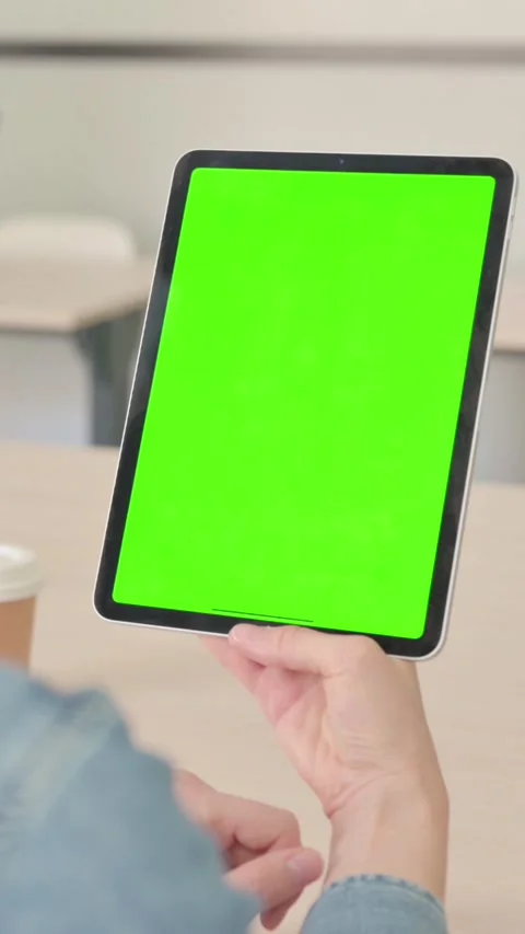 Rear View of Young Woman using Tablet with Chroma Key, Vertical Video Stock-Footage 328971201