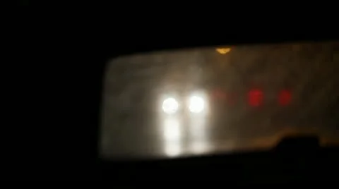 Rear Window View of Headlights Car Following Stock Video Video stock 22098842