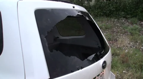  rear windshield of a chaser's SUV was smashed out during a hailstorm Stock Footage 54756804