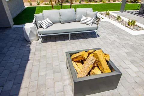 Rear Yard Fire Pit With Three Person Couch Stock Photos