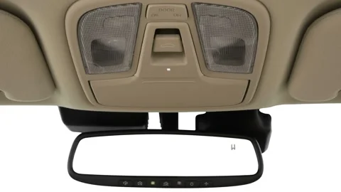 Rearview mirror close up in car interior  2016 Kia Cadenza Premium Stock Footage 159860904