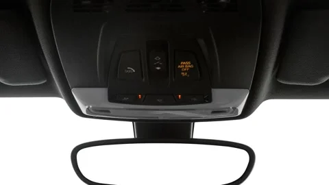 Rearview mirror close up in car interior  2017 BMW 2-series 230i Stock Footage 159918140