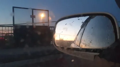 Rearview mirror on a moving car close-up 스톡 동영상 108338776