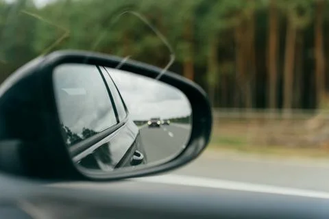 Rearview Mirror Reflection on Highway Stock Photos