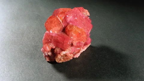 Reb ruby stone. Uncut raw precious jewel before finishing. Vivid mineral crystal Stock Footage 160889746