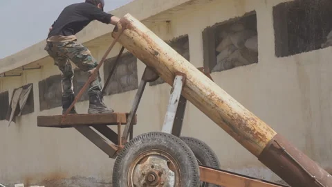Rebels in Syria fired from improvised weapons Satan pipe Video stock 169240282