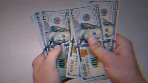 Recalculation of bundle of one hundred dollar bills Stock Footage 165844766