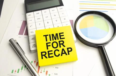 RECAP on sticky note on the notebook on the chart background Stock Photos