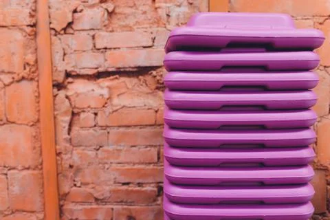 Receding row of weights lined up in a gym waiting for clients with focus to the Stock Photos
