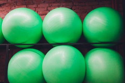 Receding row of weights lined up in a gym waiting for clients with focus to the Stock Photos