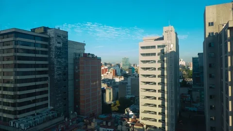 Receding shadows over cityscape Stock Footage 124512734