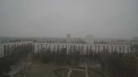 The receding view from the drone to the workers' housing. Stock Footage 165292567