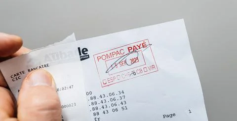Receipt with Payment Confirmation Stamp Stock Photos