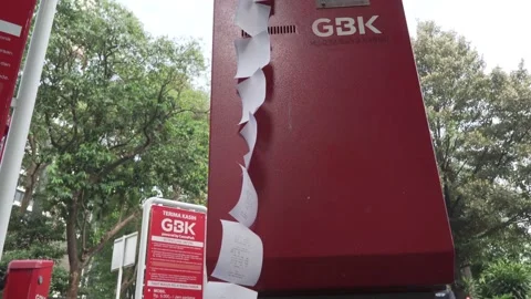Receipt of payments from parking ticket machine, hanging at disbursement receipt Stock Footage 160236393