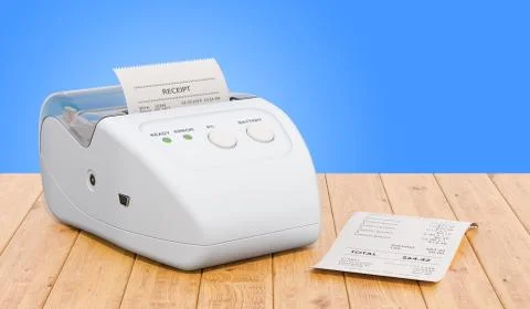 Receipt printer for POS on the wooden table, 3D rendering Stock Illustration