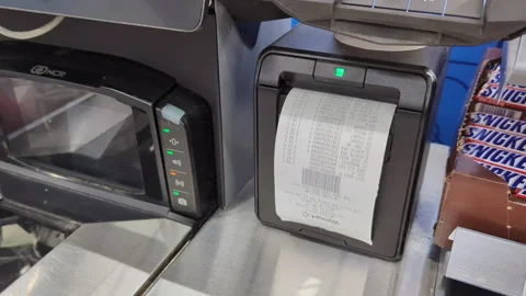 Receipt at self-checkout counter inside Walmart store. Cash register printi.. 스톡 동영상 315368120
