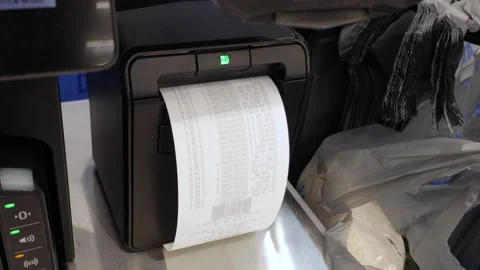 Receipt at self-checkout counter inside Walmart store. Cash register printi.. Video stock 336861540