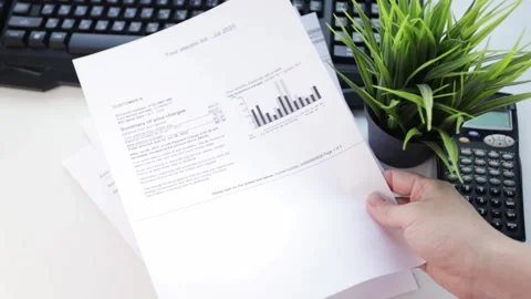 Receipt for utility services, Power bill with electricity and gas charges Stock Footage 246965810